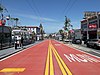 A bus stop in the median of an urban arterial