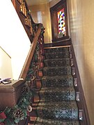 Staircase leading to the second floor of the Niels Petersen House.