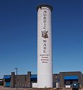 The Peavey-Haglin elevator, built in 1899-1900, still stands today. The sign painted on it advertises Nordic Ware, the current owner of the structure.