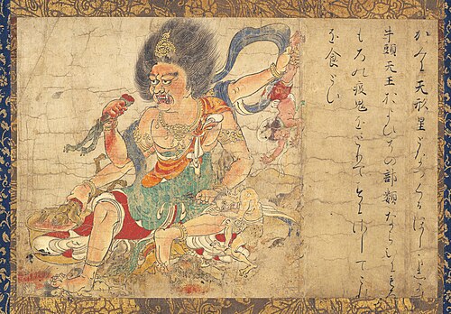 A god depicted extermination evil in a hanging scroll
