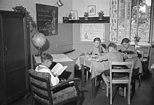 Children’s home in the GDR (East Germany) 1951. The slogan can be seen on the blackboard.