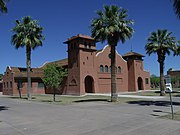 The Phoenix Indian School main building was built in 1891 and is located at 300 E. Indian School Rd.. It was listed in the National Register of Historic Places on May 31, 2001, ref. #01000521.