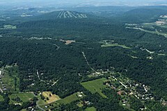 Aerial image of Roundtop Mountain, with the resort visible