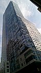 Avalon Willoughby West, a high-rise clad in blue glass, photographed during its construction