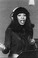 Image 1Donna Summer wearing headphones during a recording session in 1977 (from Recording studio)