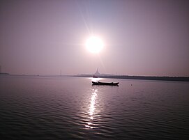 View of the pagoda from Gorai creek at sunset