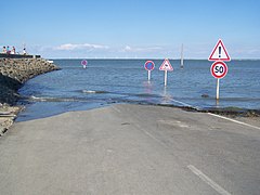 Flooded causeway (island side).