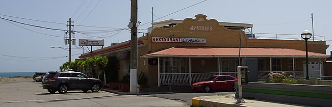 Sea-front Puerto Rican and sea food restaurant at historic train depot on Avenida Hostos Final