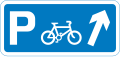 Junction ahead leading to a parking place for pedal cycles