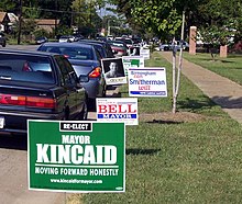 A row of yard signs