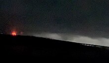 A tornado pictured in a grainy, nighttime image in southwest Indiana on May 26, 2024.