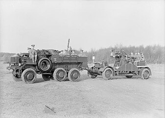 A modernized 3-incher of 6th HAA Bde towed by an AEC truck, 1934