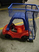 A shopping cart with space for a small child