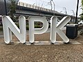 The "NPK" station code entrance signage at the southern entrance of Noble Park station, October 2024