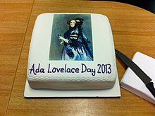 Frosted cake featuring iconic portrait of Ada Lovelace and text Ada Lovelace Day 2013.