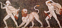 Alexander the Great (left), wearing a kausia and fighting an Asiatic lion with his friend Craterus (detail); late 4th-century BC mosaic from Pella[126]