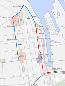 A map of Downtown Tacoma showing the L-shaped route of the current streetcar and the upside-down J-shaped route of the streetcar extension.