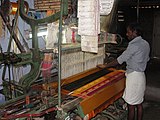 AE6. Power Loom used inside a house in a village near Salem, Tamil Nadu. Power loom accounts for more than 60% of textile production in India