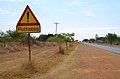 Pothole warning sign, R512 in North West Province