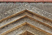 Carvings on the exterior of the Bada Gumbad Mosque.