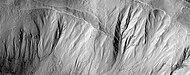 Gullies in a crater, as seen by HiRISE under HiWish program This image was named HiRISE Picture of the Day for June 25, 2024.