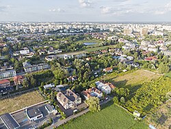 The multifamily housing near the crossing of Puławska Street and Płaskowickiej Street in Stary Imielin, in 2021.