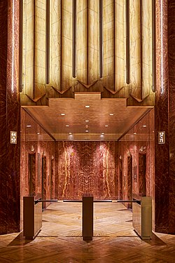 Chrysler Building lobby on 42nd street entrance, central elevator bank with art deco illumination