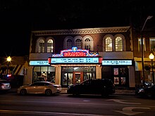 A nighttime photo of the exterior of the Grandin Theatre taken in 2023