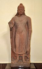 434 CE Standing Buddha, inscribed Gupta Era year 115 (434 CE), Mathura. Reign of Kumaragupta I.[141]