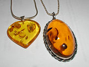 Two pendants of amber