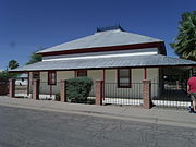 The Jacob Suter House was built in 1888 and is located in 270 Pinal St. Jacob Suter was a Swiss born tinsmith. Listed as Historic by the Historic District Advisory Commission.