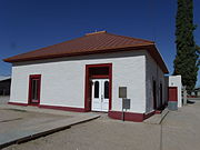 The John Clum House was built in 1878 and is located in 180 N. Granite St. The home was built by John Clum, an Indian agent, editor and publisher of Florence's first newspaper, the Arizona Citizen. He also was the founder and editor of the Tombstone Epitaph and was Tombstone's first mayor. This building appears to have housed the Citizen's office and press. A later owner, William Guild, built the telegraph line from the Silver King Mine to Casa Grande. Listed as Historic by the Historic District Advisory Commission.