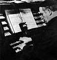 Jörg Mager playing his organ, c. 1938, photographer unknown, PIX Magazine[8]