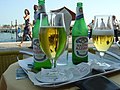 Nastro Azzurro at a sidewalk cafe in St Mark's Square, Venice, Italy.