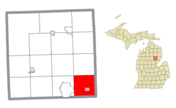 Location within Ogemaw County (red) and the administed village of Prescott (pink)
