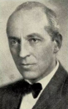 Black-and-white portrait of a middle-aged man