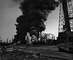 Two wells on fire, Santa Fe Springs, California, 1928