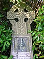 A very unusual gravestone bearing a sundial.