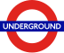 The word "UNDERGROUND" in white letters superimposed on a blue rectangle superimposed on the red circumference of a circle on a clear background