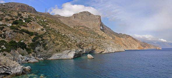Eastern Cliffs of the island island Amorgos with the monastary of Kloster Panagia Hozoviotissa, Greece