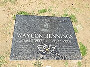 Grave site of Waylon Jennings (1937-2002). Jennings was an American singer, songwriter, musician, and actor. Jennings gave up his seat on the ill-fated flight that crashed and killed Holly, J. P. Richardson, Ritchie Valens, and pilot Roger Peterson. In 2001, he was inducted into the Country Music Hall of Fame.