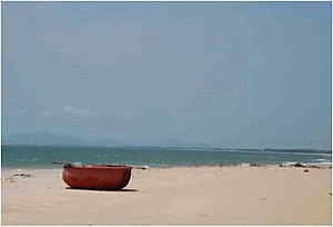 Traditional Vietnamese Fishing Boat on Ho Tram Beach