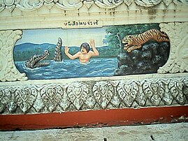 庙里描绘谚语的画作“逃出虎口却遇到鳄鱼”