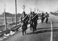 Danish soldiers cycling to the front to fight the Germans during the German invasion of Denmark in 1940