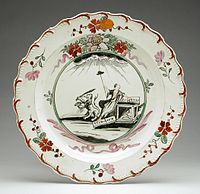 Plate with the Dutch Maiden in overglaze enamels, c. 1770; hand-painted wares such as this are relatively uncommon.