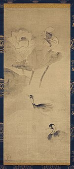 Two birds swimming in a pond with lotus flowers.