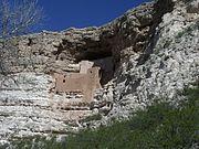 The Montezuma Castle is a historic cliff dwelling located in Montezuma Castle National Monument. The dwelling was built and used by the Pre-Columbian Sinagua people. It was occupied from approximately 1100–1425 AD, and occupation peaked around 1300 AD. Early European settlers believed that the builders were of the Aztec tribe and named the dwellings after Montezuma II, the Aztec emperor of Mexico. Listed in the National Register of Historic Places, reference #66000082.