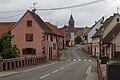 Dossenheim sur Zinsel, street view with church (l'église simultanée Saint-Léonard)