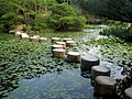 Stepping stones in the garden of the first Kyoto Imperial Palace. These stones were originally part of a 16th-century bridge over the Kamo River, which was destroyed by an earthquake.[17]