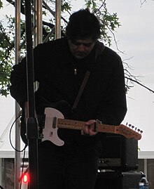 Valenzuela performing with Gin Blossoms in 2010